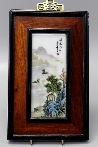 Chinese famille rose procelain plaque with wood frame.