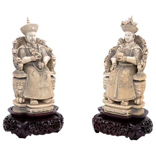 Imperial Couple. China. Early 20th Century. Carved ivory with details in black ink. Signed on base.