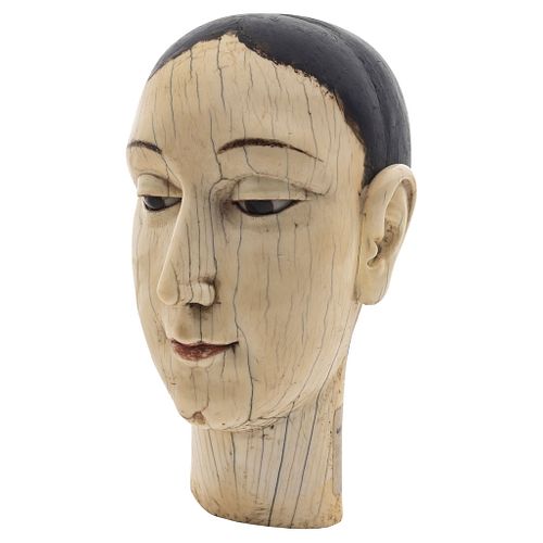 Head of a Virgin. Chinese-Hispanic. 18th Century. Carved in polychrome ivory and glass applications in eyes.