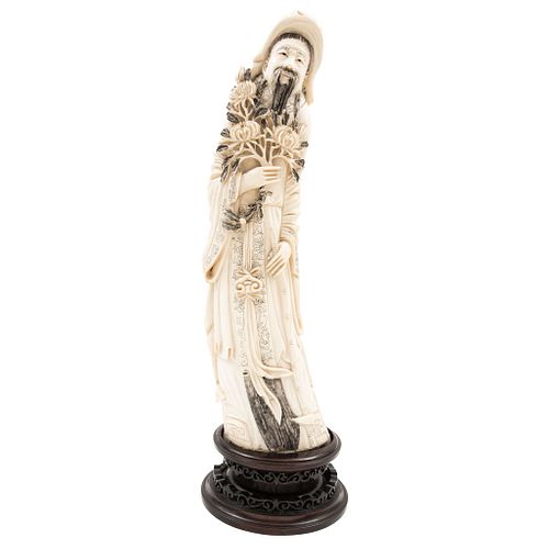 Old Man. China. Early 20th Century. Carved in ivory,sgraffito and ink details. Signed on base.