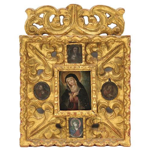 Altarpiece with Virgin of Solitude Surrounded by Saints and Passionate Angel. Mexico. 19th Century. Images in oil on sheet.