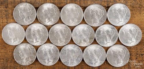Sixteen silver Peace dollars, 1923, uncirculated.