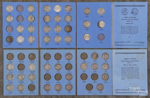 Partial set of Walking Liberty half dollars, 1916-1947, in two collection books