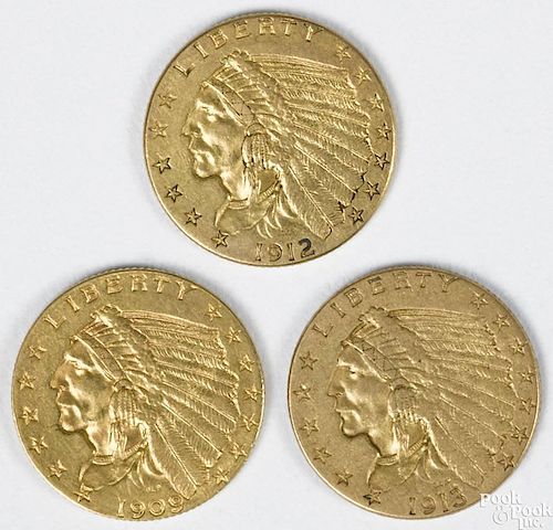 Three Indian Head two and a half dollar gold pieces, to include a 1909, AU, a 1912, XF, and a 1913, VF.