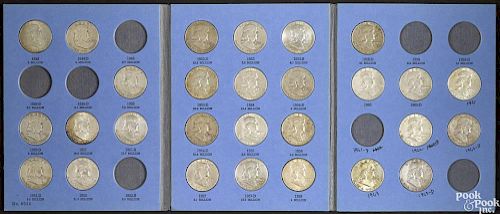 Partial set of twenty-eight Franklin half dollars, in collection book, VG-UNC.