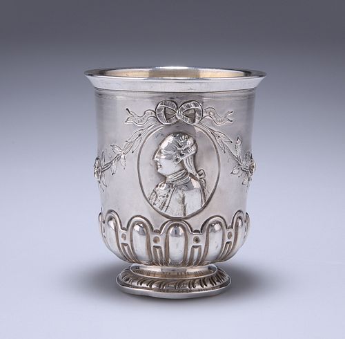A FRENCH SILVER BEAKER, REPOUSSE WITH PROFILE PORTRAITS OF LOUIS XVI AND MA