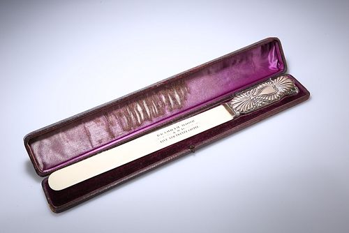 HUNTING INTEREST: A LATE VICTORIAN SILVER-MOUNTED IVORY PAGE TURNER, THE SI