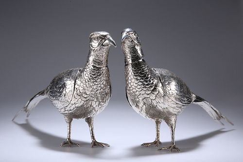 A LARGE MATCHED PAIR OF EDWARDIAN SILVER TABLE PHEASANTS, one with import m