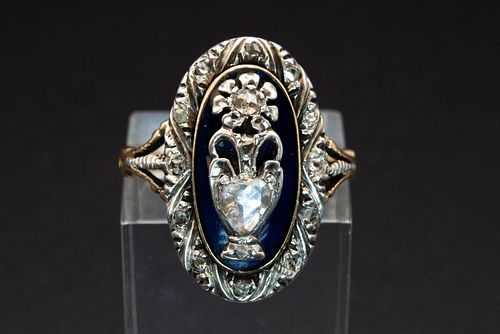 A GEORGIAN MEMORIAL RING, the oval mount of textured detailing and dark blu