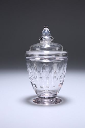 AN 18TH CENTURY GLASS CADDY, the cover with acorn knop, the body with slice
