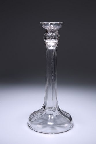 AN 18TH CENTURY HOLLOW-STEM GLASS CANDLESTICK, the tall stick with crimped 