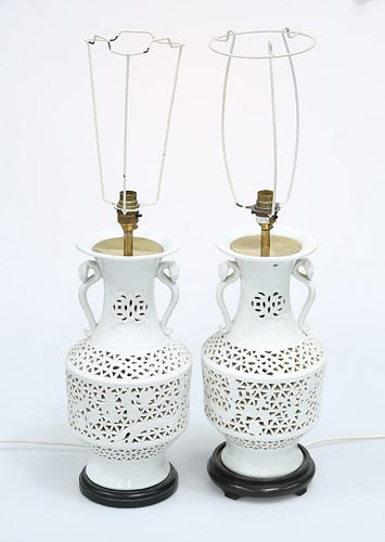 A PAIR OF CHINESE BLANC DE CHINE RETICULATED TABLE LAMPS, the necks applied