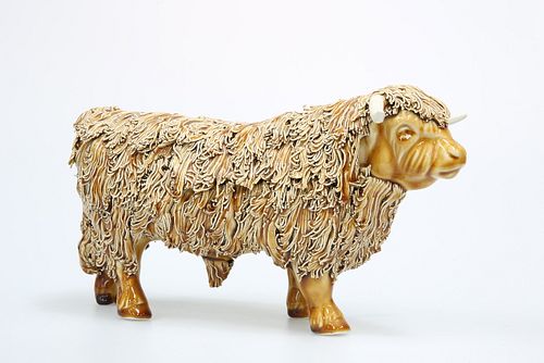 A POTTERY MODEL OF A HIGHLAND BULL, signed Craig Gilchrist, with shredded c
