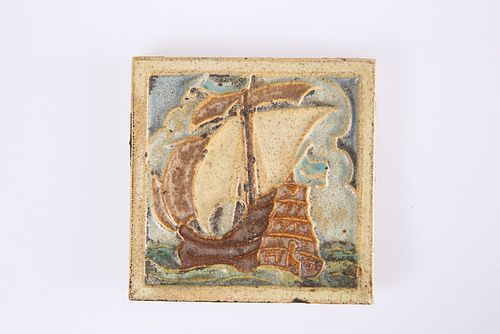 AN ARTS AND CRAFTS POTTERY TILE, PROBABLY AMERICAN, POSSIBLY GRUEBY OR ROOK