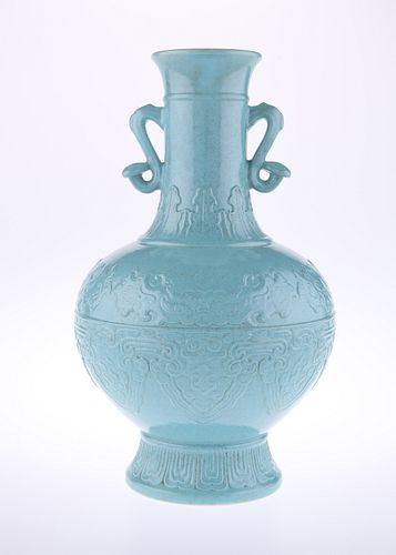 A CHINESE TURQUOISE GLAZED VASE, the globular moulded body issuing a neck a