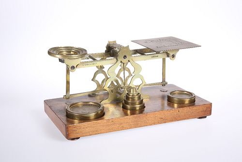 A SET OF LATE VICTORIAN BRASS POSTAL SCALES, SAMUEL MORDAN & CO., of charac