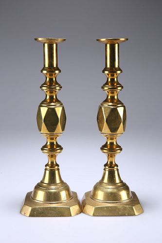 A PAIR OF VICTORIAN ACE OF DIAMONDS BRASS CANDLESTICKS, with ejectors, 35.5