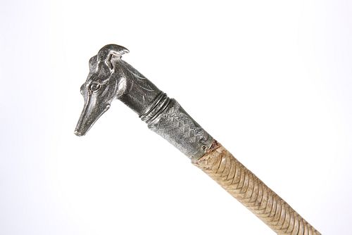 A LATE 19th CENTURY HOUND'S HEAD LADY'S CARRIAGE WHIP, the silver plated te