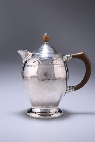 LIBERTY & CO., A SILVER HOT WATER JUG, BIRMINGHAM 1919, ovoid, the domed co