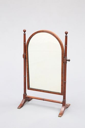 A REGENCY MAHOGANY TOILET MIRROR, with arch top and ring moulded uprights. 