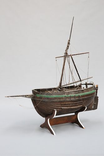 A LARGE VICTORIAN OAK MODEL OF A WHITBY BOAT, "HOPEFULL", on a later stand.