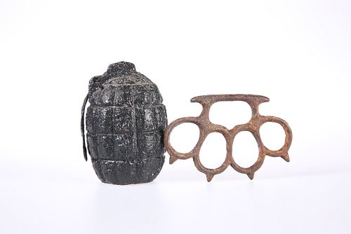 A MILLS 36M GRENADE, inert; together with AN IRON KNUCKLE DUSTER, each repu