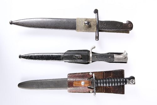 THREE BAYONETS, including German WWII dress bayonet and a Swiss 1943 bayone