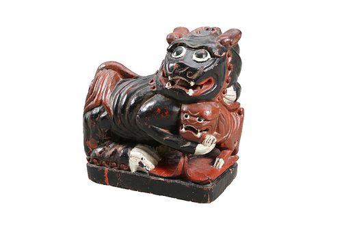 A LARGE CHINESE CARVED POLYCHROME SHI SHI. 36cm high