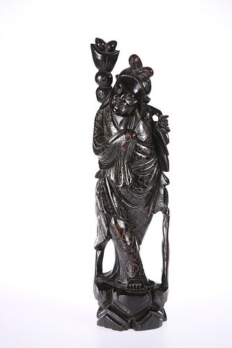 A JAPANESE SILVER INLAID HARDWOOD FIGURE, EARLY 20TH CENTURY, carved wearin