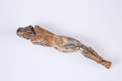 AN EARLY NORTHERN EUROPEAN CARVED WOODEN CORPUS CHRISTI, (lacking arms). 26