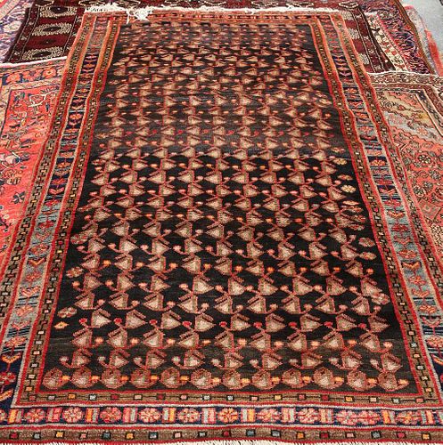 A MALAYER CARPET, with a repeating design. 300cm by 160cm