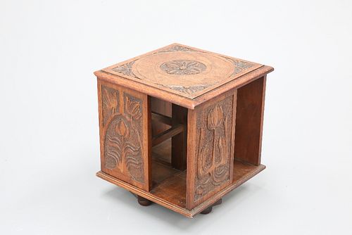 A LATE VICTORIAN WALNUT TABLE-TOP REVOLVING BOOKCASE, square, carved with A