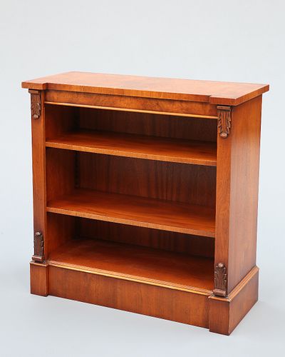 A REGENCY STYLE BURR WALNUT OPEN BOOKCASE, the featherbanded and quarter-ve