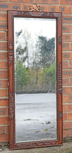 A CHINESE HARDWOOD MIRROR, EARLY 20TH CENTURY, the rectangular frame carved