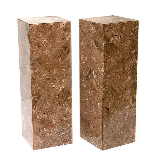 Pair of marble stands.