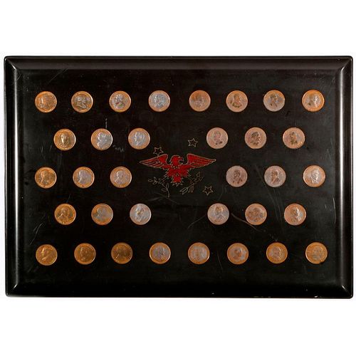 A lacquer tray with presidential coins.