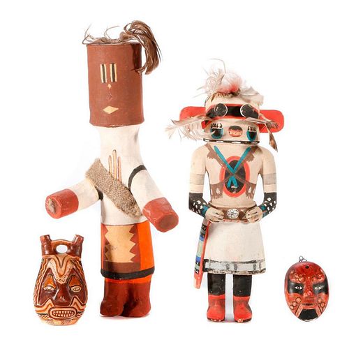 Two kachina dolls and two Mexican terra cottas.