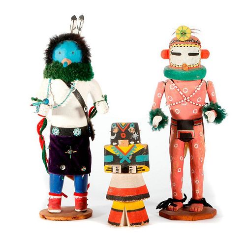 Three Kachina dolls.
