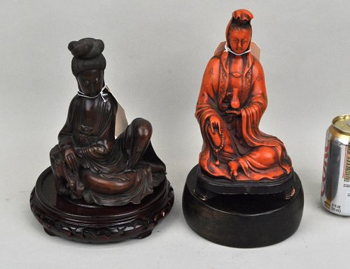 Two Seated Guanyin Figures on Wood Stands