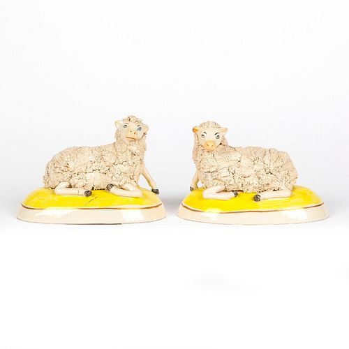 2 HAND MADE CERAMIC FIGURES LAYING DOWN SHEEP