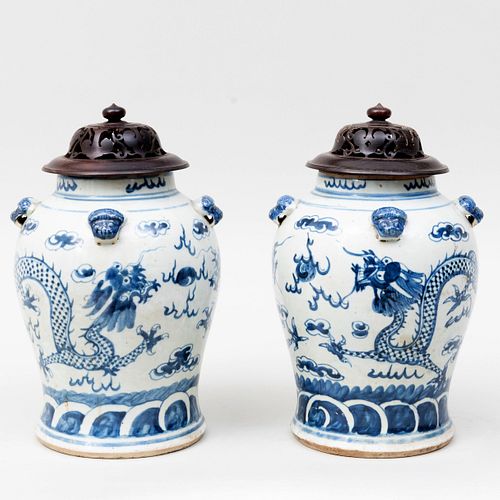 Pair of Chinese Blue and White Porcelain Ginger Jars with a Pair of Carved Wood Covers