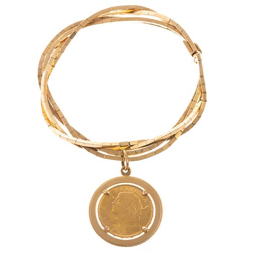 A Braided Bracelet in 18K with 20 Swiss Franc Coin