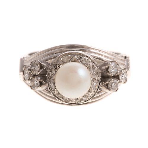A Pearl & Diamond Ring in 18K
