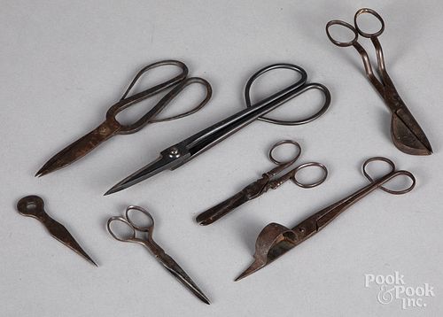 Seven wrought iron scissors and snuffers, 19th c.