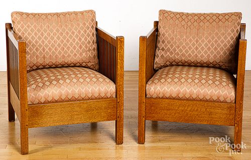Pair of Stickley oak armchairs.