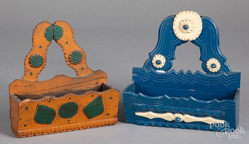 Two painted tramp art wall pockets, ca. 1900