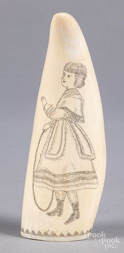 Scrimshaw whale tooth