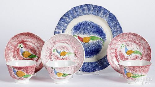 Three red spatter peafowl cups and saucers