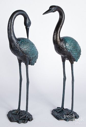 Pair of painted iron egret lawn ornaments.