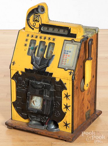 Early five cent slot machine.